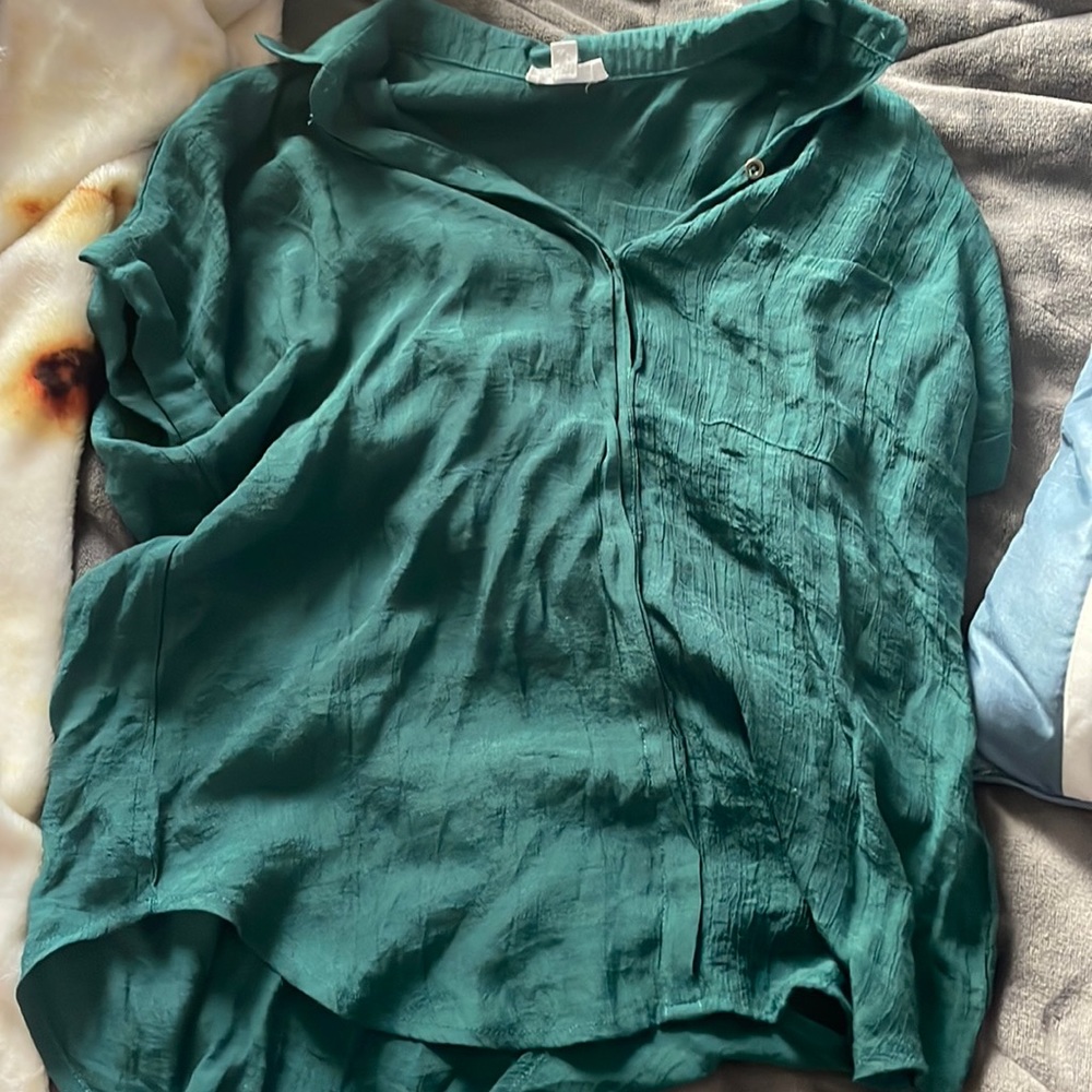 Green button up shirt